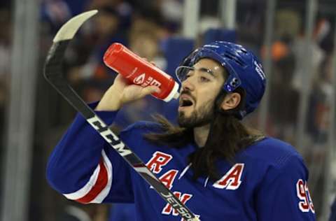 NEW YORK, NEW YORK – SEPTEMBER 26: Mika Zibanejad #93 of the New York Rangers takes a water break during warm-ups prior to the game against the New York Islanders at Madison Square Garden on September 26, 2022, in New York City. (Photo by Bruce Bennett/Getty Images)