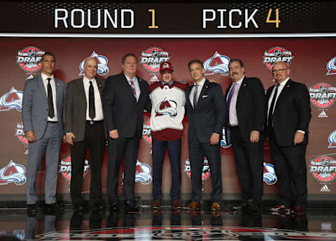 CHICAGO, IL – JUNE 23: (L-R) Head coach Jared Bednar, draft team member, draft team member, fourth overall pick Cale Makar, general manager Joe Sakic, director of reserve list scouting Brad Smith and director of amateur scouting Alan Hepple of the Colorado Avalanche pose for a photo onstage during Round One of the 2017 NHL Draft at United Center on June 23, 2017 in Chicago, Illinois. (Photo by Dave Sandford/NHLI via Getty Images)