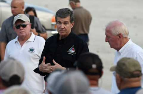 North Carolina Gov. Roy Cooper addresses farmers, first responders and small business owners in Trenton, N.C., on Friday, Sept. 21, 2018, as he tours agricultural areas of the state hit hard by Hurricane Florence. (Scott Sharpe/Raleigh News & Observer/TNS via Getty Images)