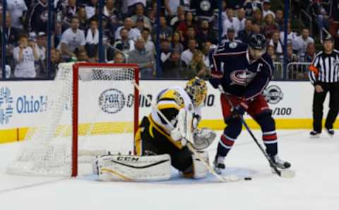 Apr 16, 2017; Columbus, OH, USA; Pittsburgh Penguins goalie Marc-Andre Fleury (29) makes a save against Columbus Blue Jackets left wing Nick Foligno (71) during the third period in game three of the first round of the 2017 Stanley Cup Playoffs at Nationwide Arena. Mandatory Credit: Russell LaBounty-USA TODAY Sports