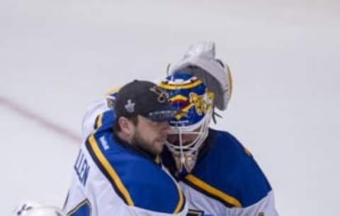 May 7, 2016; Dallas, TX, USA; St. Louis Blues goalie Jake Allen (34) celebrates with goalie Brian Elliott (1) after defeating the Dallas Stars 4-1 in game five of the second round of the 2016 Stanley Cup Playoffs at American Airlines Center. Mandatory Credit: Jerome Miron-USA TODAY Sports