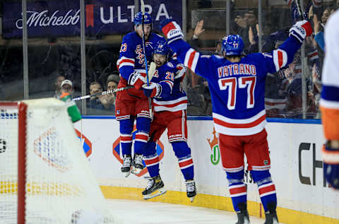 Mar 17, 2022; New York, New York, USA; New York Rangers left wing Chris Kreider (20) celebrates his 40th goal of the season during the second period against the New York Islanders at Madison Square Garden. Mandatory Credit: Danny Wild-USA TODAY Sports