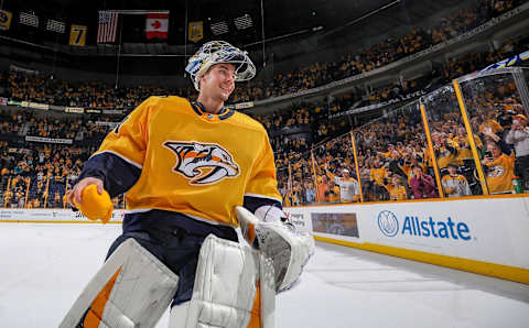 NASHVILLE, TN – MARCH 29: Juuse Saros #74 of the Nashville Predators skates as Third Star of the Game after a 5-3 win against the San Jose Sharks during an NHL game at Bridgestone Arena on March 29, 2018 in Nashville, Tennessee. (Photo by John Russell/NHLI via Getty Images)