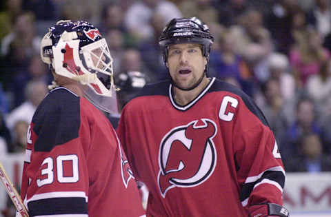 Scott Stevens and Martin Brodeur (Mandatory Credit: Harry How/ALLSPORT)