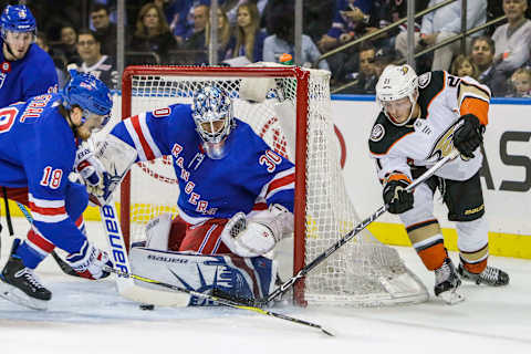 NEW YORK, NY – DECEMBER 19: Anaheim Ducks Winger Chris Wagner (21) attempts wrap around shot against New York Rangers Goalie Henrik Lundqvist (30) as New York Rangers Defenseman Marc Staal (18) defends during the Anaheim Ducks and New York Rangers NHL game on December 19, 2017, at Madison Square Garden in New York, NY. (Photo by John Crouch/Icon Sportswire via Getty Images)