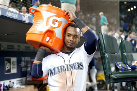 Segura waits to give now divisional rival Cano a Gatorade bath. Photo by Abbie Parr/Getty Images.