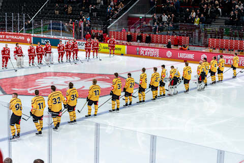 LAUSANNE, SWITZERLAND – DECEMBER 03: Team Lausanne HC and team Lulea HF lines up for national anthem during the Champions Hockey League match between Lausanne HC and Lulea HF at Vaudoise Arena on December 3, 2019 in Lausanne, Switzerland. (Photo by RvS.Media/Monika Majer/Getty Images)