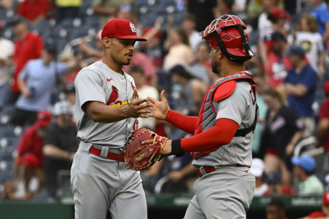 Jun 19, 2023; Washington, District of Columbia, USA; St. Louis Cardinals relief pitcher Jordan Hicks (12) is congratulated by catcher Willson Contreras (40) after earning a save against the Washington Nationals at Nationals Park. Mandatory Credit: Brad Mills-USA TODAY Sports