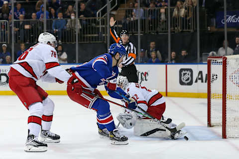 Apr 26, 2022; New York, New York, USA; New York Rangers left wing Chris Kreider (20) scores a goal against Carolina Hurricanes goaltender Pyotr Kochetkov (52) during the second period at Madison Square Garden. Mandatory Credit: Tom Horak-USA TODAY Sports