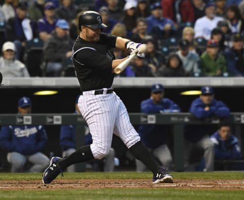 DENVER, CO – SEPTEMBER 29: Colorado Rockies first baseman Mark Reynolds (12) hits his 30th homer to right center to drive in shortstop Trevor Story (27) in the first inning against the Los Angeles Dodgers on September 29, 2017 in Denver, Colorado at Coors Field. (Photo by John Leyba/The Denver Post via Getty Images)