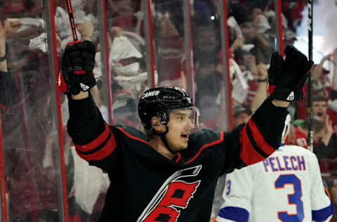 RALEIGH, NC – MAY 03: Sebastian Aho #20 of the Carolina Hurricanes celebrates after scoring a goal in Game Four of the Eastern Conference Second Round against the New York Islanders during the 2019 NHL Stanley Cup Playoffs on May 3, 2019 at PNC Arena in Raleigh, North Carolina. (Photo by Gregg Forwerck/NHLI via Getty Images)