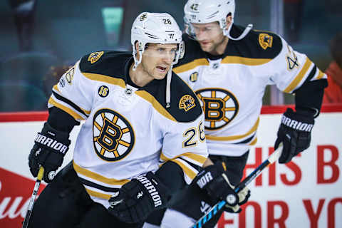 Mar 15, 2017; Calgary, Alberta, CAN; Boston Bruins defenseman John-Michael Liles (26) during the warmup period against the Calgary Flames at Scotiabank Saddledome. Mandatory Credit: Sergei Belski-USA TODAY Sports