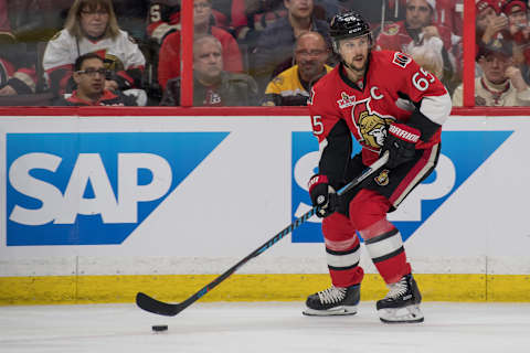 Apr 12, 2017; Ottawa, Ontario, CAN; Ottawa Senators defenseman Erik Karlsson (65) skates with the puck in the first period against the Boston Bruins in game one of the first round of the 2017 Stanley Cup Playoffs at Canadian Tire Centre. Mandatory Credit: Marc DesRosiers-USA TODAY Sports