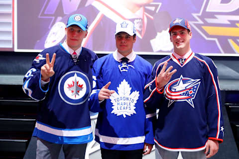 Winnipeg Jets second overall pick Patrik Laine, and Columbus Blue Jackets third overall pick Pierre-Luc Dubois. (Photo by Bruce Bennett/Getty Images)