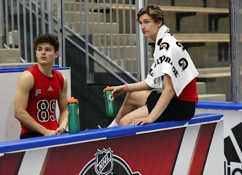 BUFFALO, NY – JUNE 1: Alex Turcotte (left) and Trevor Zegras (right) watch training during the 2019 NHL Scouting Combine on June 1, 2019 at Harborcenter in Buffalo, New York. (Photo by Bill Wippert/NHLI via Getty Images)