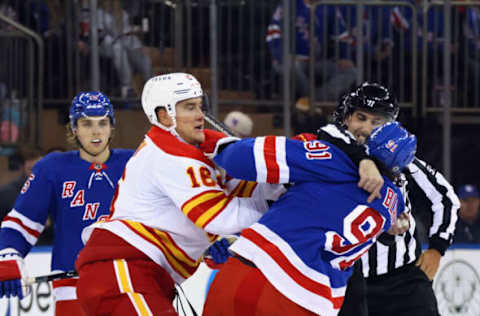 NEW YORK, NEW YORK – FEBRUARY 06: Nikita Zadorov #16 of the Calgary Flames goes after Sammy Blais #91 of the New York Rangers following his check on Milan Lucic #17 (not shown) during the first period at Madison Square Garden on February 06, 2023, in New York City. (Photo by Bruce Bennett/Getty Images)