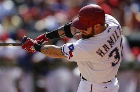 Oct 3, 2015; Arlington, TX, USA; Texas Rangers left fielder Josh Hamilton (32) follows through on his solo home run against the Los Angeles Angels during the seventh inning of a baseball game at Globe Life Park in Arlington. The Angels won 11-10. Mandatory Credit: Jim Cowsert-USA TODAY Sports