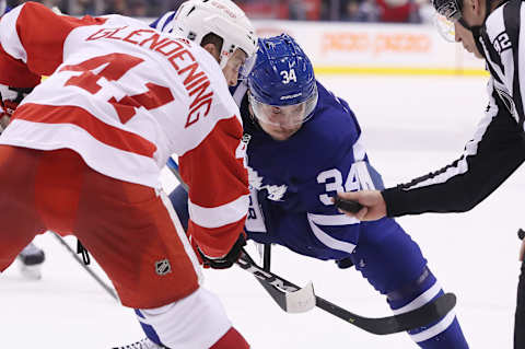 TORONTO, ON- DECEMBER 23 – Toronto Maple Leafs center Auston Matthews (34) faces-off against Detroit Red Wings center Luke Glendening (41) as the Toronto Maple Leafs beat the Detroit Red Wings 5-4 in overtime at Scotiabank Arena in Toronto. December 23, 2018. (Steve Russell/Toronto Star via Getty Images)