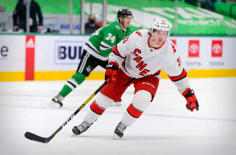 Feb 11, 2021; Dallas, Texas, USA; Carolina Hurricanes left wing Brock McGinn (23) skates against the Dallas Stars during the third period at the American Airlines Center. Mandatory Credit: Jerome Miron-USA TODAY Sports