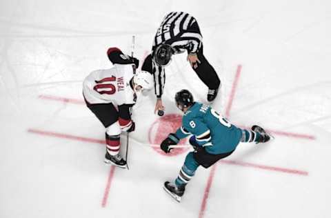 SAN JOSE, CA – FEBRUARY 02: Joe Pavelski #8 of the San Jose Sharks takes a face-off against Jordan Weal #10 of the Arizona Coyotes at SAP Center on February 2, 2018 in San Jose, California (Photo by Brandon Magnus/NHLI via Getty Images)