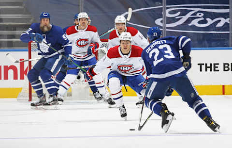 TORONTO, ON – MAY 31: Jake Evans #71 of the Montreal Canadiens defends against Travis Dermott #23 of the Toronto Maple Leafs  . (Photo by Claus Andersen/Getty Images)