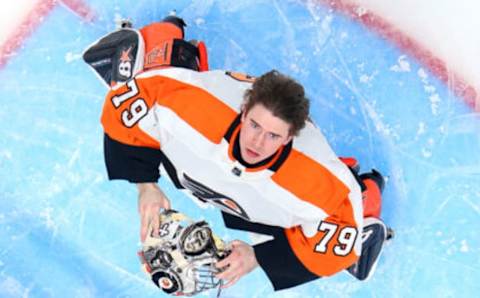 ELMONT, NEW YORK – APRIL 08: Carter Hart #79 of the Philadelphia Flyers prepares to play against the New York Islanders at the UBS Arena on April 08, 2023 in Elmont, New York. The Islanders shut out the Flyers 4-0. (Photo by Bruce Bennett/Getty Images)