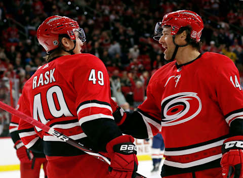 The Carolina Hurricanes’ Victor Rask (49) celebrates his goal with Justin Williams (14) during the first period against the Washington Capitals at PNC Arena in Raleigh, N.C., on Tuesday, Jan. 2, 2018. (Chris Seward/Raleigh News