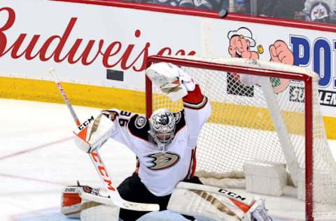 WINNIPEG, MB – MARCH 23: Goaltender John Gibson #36 of the Anaheim Ducks does the splits in the crease as the puck flies over the net during second-period action against the Winnipeg Jets on March 23, 2018. (Photo by Jonathan Kozub/NHLI via Getty Images)