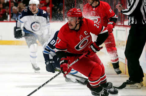 RALEIGH, NC – MARCH 4: Justin Faulk #27 of the Carolina Hurricanes corrals the puck at the blue line during an NHL game against the Winnipeg Jets on March 4, 2018 at PNC Arena in Raleigh, North Carolina. (Photo by Gregg Forwerck/NHLI via Getty Images)