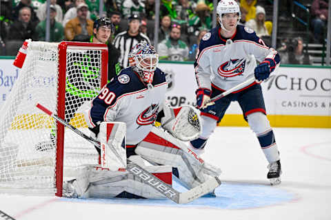 Oct 30, 2023; Dallas, Texas, USA; Columbus Blue Jackets goaltender Elvis Merzlikins (90) and defenseman Damon Severson (78) in action during the game between the Dallas Stars and the Columbus Blue Jackets at American Airlines Center. Mandatory Credit: Jerome Miron-USA TODAY Sports