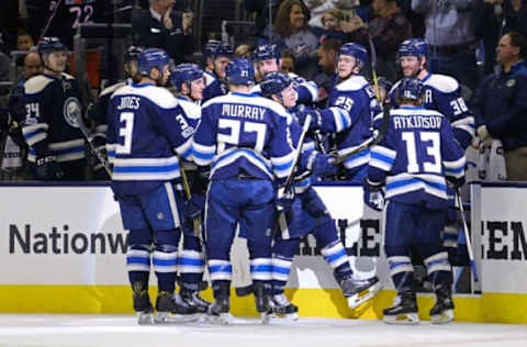 NHL Power Rankings: Columbus Blue Jackets left wing Matt Calvert (center right) celebrates with teammates after scoring an empty net goal against the Toronto Maple Leafs in the third period at Nationwide Arena. The Blue Jackets won 5-2. Mandatory Credit: Aaron Doster-USA TODAY Sports