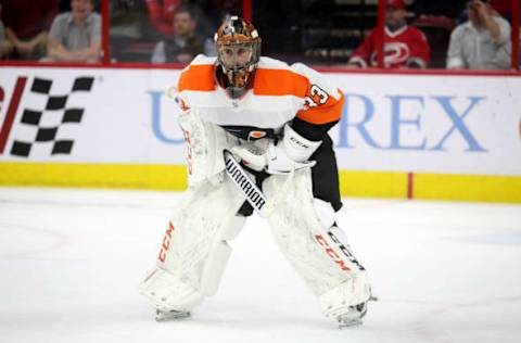 RALEIGH, NC – MARCH 30: Cam Talbot #33 of the Philadelphia Flyers comes out of the crease to leave an empty net during an NHL game against the Carolina Hurricanes on March 30, 2019 at PNC Arena in Raleigh, North Carolina. (Photo by Gregg Forwerck/NHLI via Getty Images)