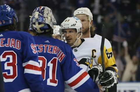 NEW YORK, NEW YORK – MAY 15: Sidney Crosby #87 of the Pittsburgh Penguins and Igor Shesterkin #31 of the New York Rangers shake hands following the Rangers’ overtime victory in Game Seven of the First Round of the 2022 Stanley Cup Playoffs at Madison Square Garden on May 15, 2022, in New York City. The Rangers defeated the Penguins 4-3 in overtime to move on to round two. (Photo by Bruce Bennett/Getty Images)