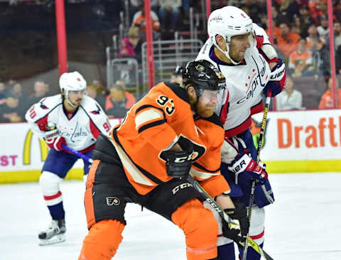 Mar 30, 2016; Philadelphia, PA, USA; Philadelphia Flyers left wing Jakub Voracek (93) battles with Washington Capitals left wing Alex Ovechkin (8) during the second period at Wells Fargo Center. Mandatory Credit: Eric Hartline-USA TODAY Sports