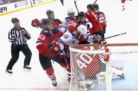 NEWARK, NEW JERSEY – APRIL 27: Akira Schmid #40 of the New Jersey Devils defends the net against the New York Rangers in Game Five of the First Round of the 2023 Stanley Cup Playoffs at Prudential Center on April 27, 2023, in Newark, New Jersey. (Photo by Bruce Bennett/Getty Images)