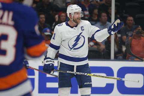 Jun 17, 2021; Uniondale, New York, USA; Tampa Bay Lightning center Steven Stamkos (91) argues with a referee during the third period of game three of the 2021 Stanley Cup Semifinals against the New York Islanders at Nassau Veterans Memorial Coliseum. Mandatory Credit: Brad Penner-USA TODAY Sports