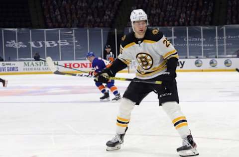 UNIONDALE, NEW YORK – JANUARY 18: Brandon Carlo #25 of the Boston Bruins skates against the New York Islanders at the Nassau Coliseum on January 18, 2021 in Uniondale, New York. The Islanders shut-out the Bruins 1-0. (Photo by Bruce Bennett/Getty Images)