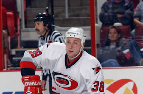 RALEIGH, NC – SEPTEMBER 28: Defenseman Igor Knyazev #38 of the Carolina Hurricanes skates on the ice during the NHL preseason game against the Washington Capitals on September 28, 2002 at the RBC Center in Raleigh, North Carolina. The Capitals won 6-1. (Photo by Dave Sandford/Getty Images/NHLI)