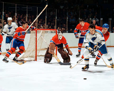 MONTREAL, CANADA – CIRCA 1960’s: Rogatien Vachon #1 of the Montreal Canadiens guards the net while Jim Roberts #6 of the St. Louis Blues gets control of the puck during a game at the Montreal Forum circa 1960’s in Montreal, Quebec, Canada. (Photo by Denis Brodeur/NHLI via Getty Images)