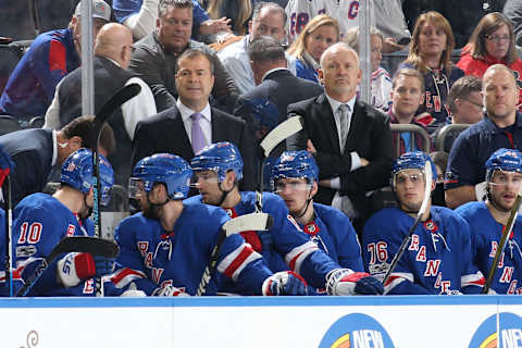 NEW YORK, NY – OCTOBER 14: Head coach Alain Vigneault and assistant coach Lindy Ruff of the New York Rangers watch the action from the bench during the game against the New Jersey Devils at Madison Square Garden on October 14, 2017 in New York City. The New Jersey Devils won 3-2. (Photo by Jared Silber/NHLI via Getty Images)