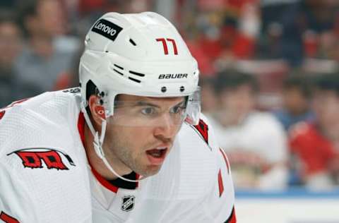 SUNRISE, FL – NOVEMBER 6: Tony DeAngelo #77 of the Carolina Hurricanes prepares for a face-off against the Florida Panthers at the FLA Live Arena on November 6, 2021, in Sunrise, Florida. (Photo by Joel Auerbach/Getty Images)