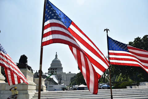 US flags are seen near the Mall in front of the US Capitol in Washington, DC on July 3, 2018, a day ahead of the Independence Day holiday. (Photo by MANDEL NGAN / AFP) (Photo credit should read MANDEL NGAN/AFP/Getty Images)