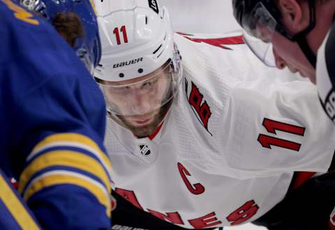 Apr 5, 2022; Buffalo, New York, USA; Carolina Hurricanes center Jordan Staal (11) waits for the official to drop the puck for a face-off during the first period against the Buffalo Sabres at KeyBank Center. Mandatory Credit: Timothy T. Ludwig-USA TODAY Sports