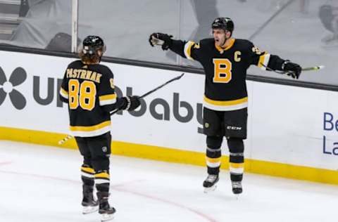 Mar 5, 2021; Boston, Massachusetts, USA; Boston Bruins center Patrice Bergeron (37) celebrates after scoring a goal against the Washington Capitals during the second period at TD Garden. Mandatory Credit: Paul Rutherford-USA TODAY Sports