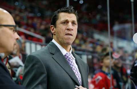 Nov 7, 2014; Raleigh, NC, USA; Carolina Hurricanes assistant coach Rod Brind’Amour looks on from the bench against the Columbus Blue Jackets at PNC Arena. The Carolina Hurricanes defeated the Columbus Blue Jackets 3-2 in overtime. Mandatory Credit: James Guillory-USA TODAY Sports