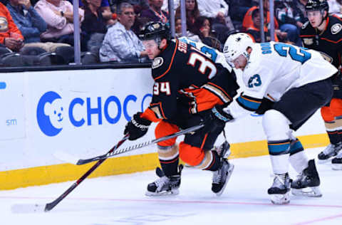 ANAHEIM, CA – SEPTEMBER 20: Anaheim Ducks center Sam Steel (34) tries to maneuver around San Jose Sharks right wing Barclay Goodrow (23) during an NHL preseason game between the Anaheim Ducks and the San Jose Sharks played on September 20, 2018, at the Honda Center in Anaheim, CA.