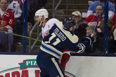 COLUMBUS, OH – FEBRUARY 11: Columbus Blue Jackets Winger Nick Foligno (71) checks Detroit Red Wings Defenceman Mike Green (25) during a regular season game between the Columbus Blue Jackets and Detroit Red Wings on February 11, 2017, at Nationwide Arena in Columbus, OH. The Columbus Blue Jackets won 2-1 over the Detroit Red Wings. (Photo by Michael Griggs/Icon Sportswire via Getty Images)