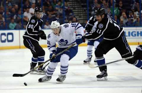 Mar 28, 2016; Tampa, FL, USA; Toronto Maple Leafs right wing Connor Brown (16) skates with the puck as Tampa Bay Lightning center Brian Boyle (11) defends during the third period at Amalie Arena. Tampa Bay Lightning defeated the Toronto Maple Leafs 3-0. Mandatory Credit: Kim Klement-USA TODAY Sports