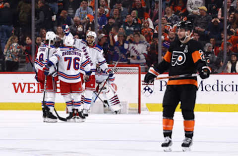 PHILADELPHIA, PENNSYLVANIA – DECEMBER 17: The New York Rangers celebrate a goal scored during the third period against the Philadelphia Flyers at Wells Fargo Center on December 17, 2022, in Philadelphia, Pennsylvania. (Photo by Tim Nwachukwu/Getty Images)