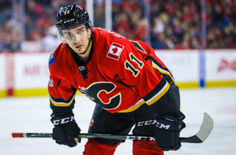 Mar 5, 2017; Calgary, Alberta, CAN; Calgary Flames center Mikael Backlund (11) during the face off against the New York Islanders during the second period at Scotiabank Saddledome. Mandatory Credit: Sergei Belski-USA TODAY Sports